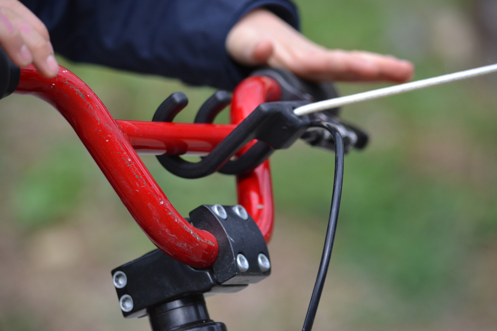 Système de traction de vélo Tire-Velo pour tracter un vélo enfant